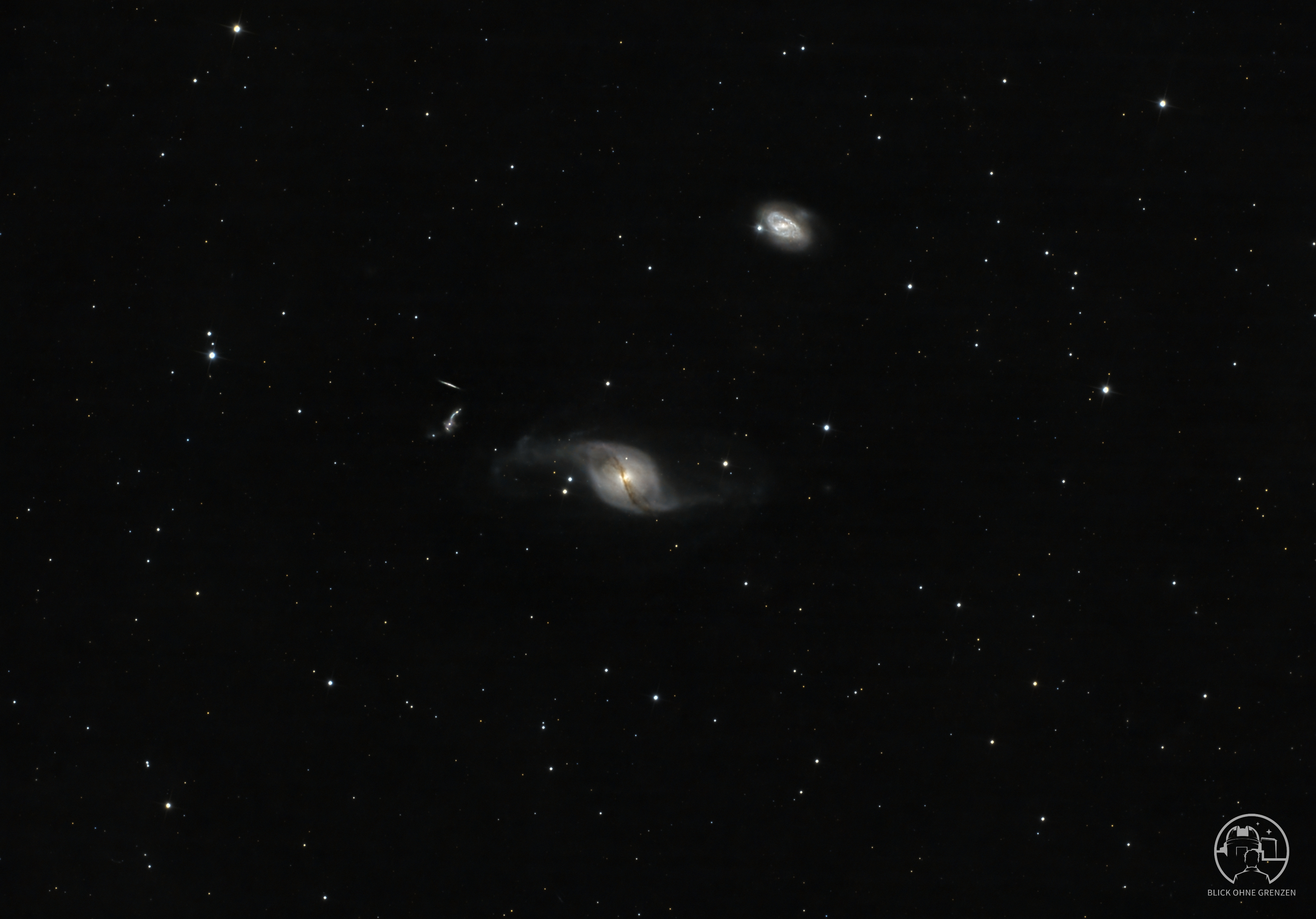 Arp 214 / NGC 3718 – Das kosmische Integralzeichen